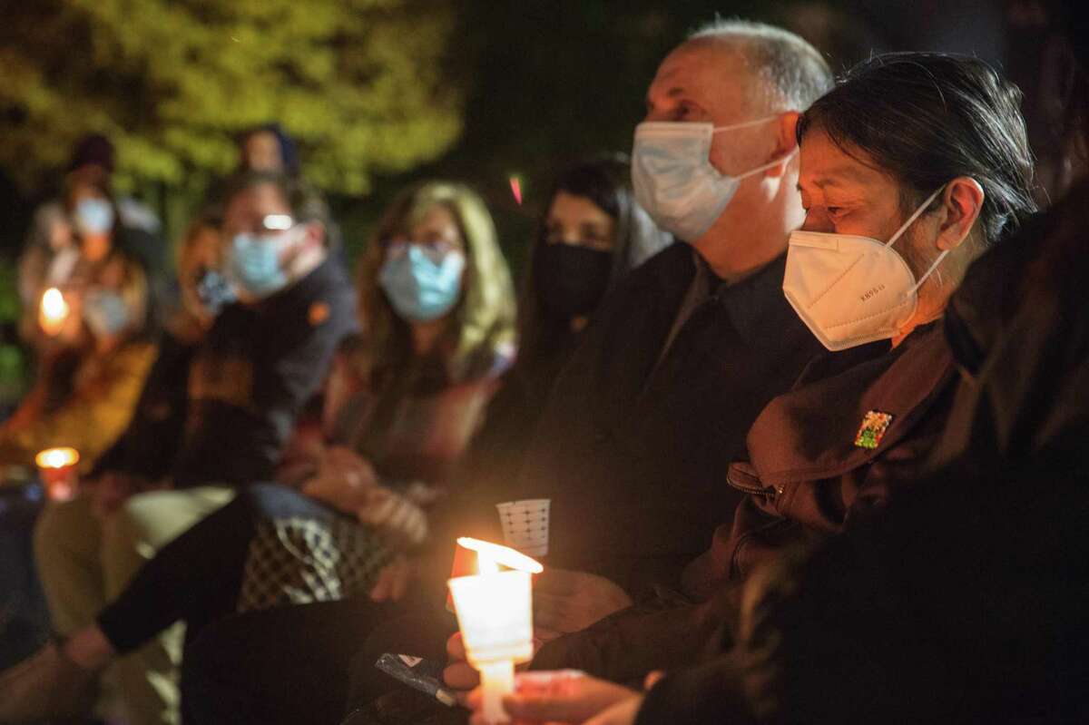 Richard and Maridine Zieman attend a candlelight vigil at Sherman Elementary School in Cow Hollow for their son, Andrew Zieman, an educator who was killed by a motorist at the intersection of Franklin and Union streets next to the school where he worked.
