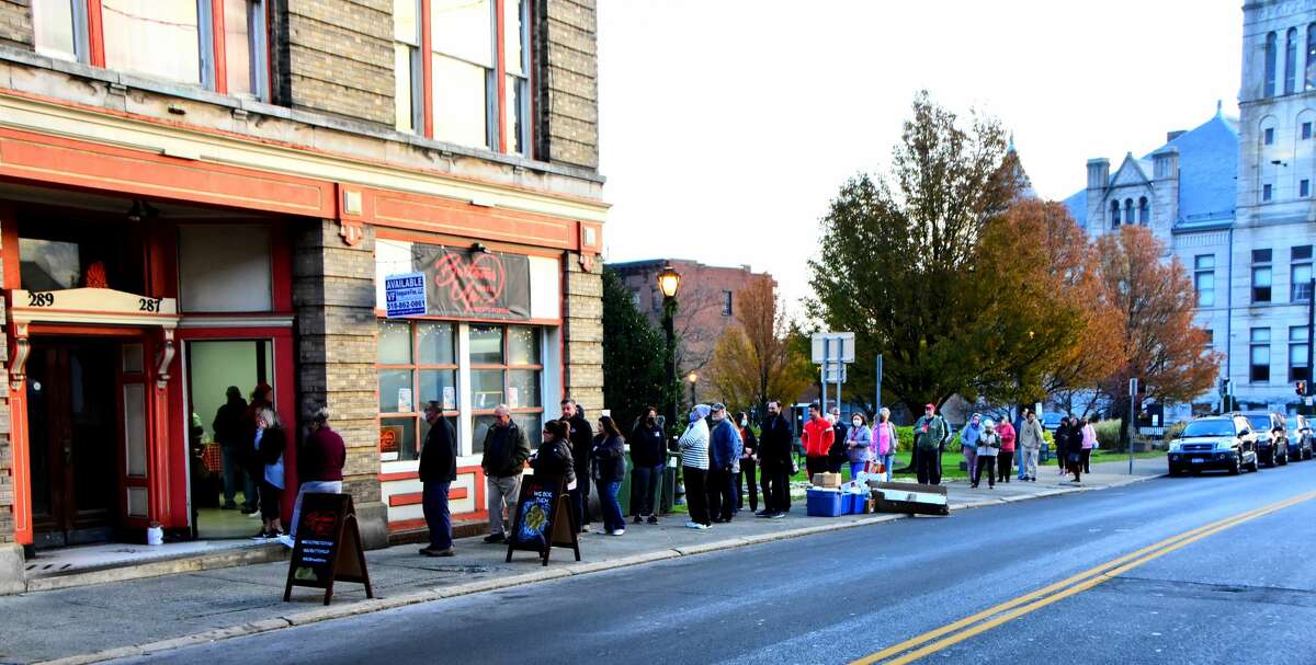 The line at 7:20 a.m. Thursday, Nov. 18, in Cohoes for a five-day pop-up by Baltimore-based Bottoms Up Bagels. It is being held at 299 Ontario St., serving from 7 a.m. until supplies run out, which was within two hours on each of the first two days. The pop-up continues through Sunday, Nov. 21. Cohoes City Hall is at right.