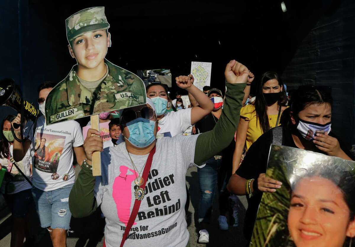 Gloria Guillen, mother of Army Pfc. Vanessa Guillen, marches with people from Guadalupe Plaza to George Thomas Mickey Leland Federal Building, honoring what would have been her daughter's 21st birthday, on Saturday, Oct. 3, 2020, in Houston.