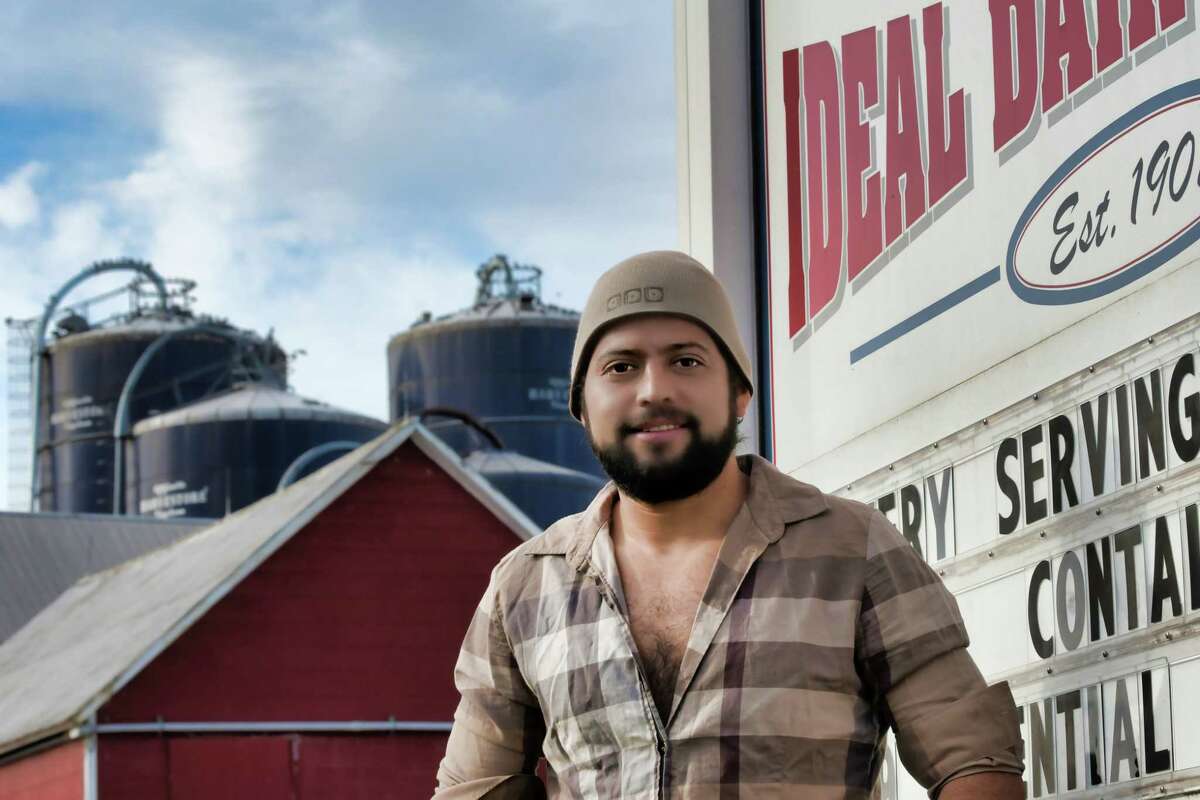 Asuncion Cruz Jimenez, maternity manager at Ideal Dairy Farms, at the farm on Thursday, Nov. 11, 2021, in Hudson Falls, N.Y.