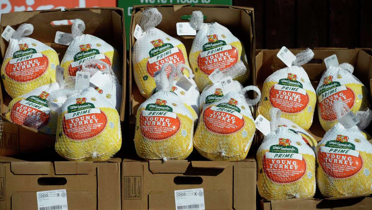 Stew Leonard’s employees, with the help from members of the Danbury Fire department, distributed turkeys to people in need and representatives of local food pantries, shelters and charities on Thursday morning. November 18, 2021, Danbury, Conn.