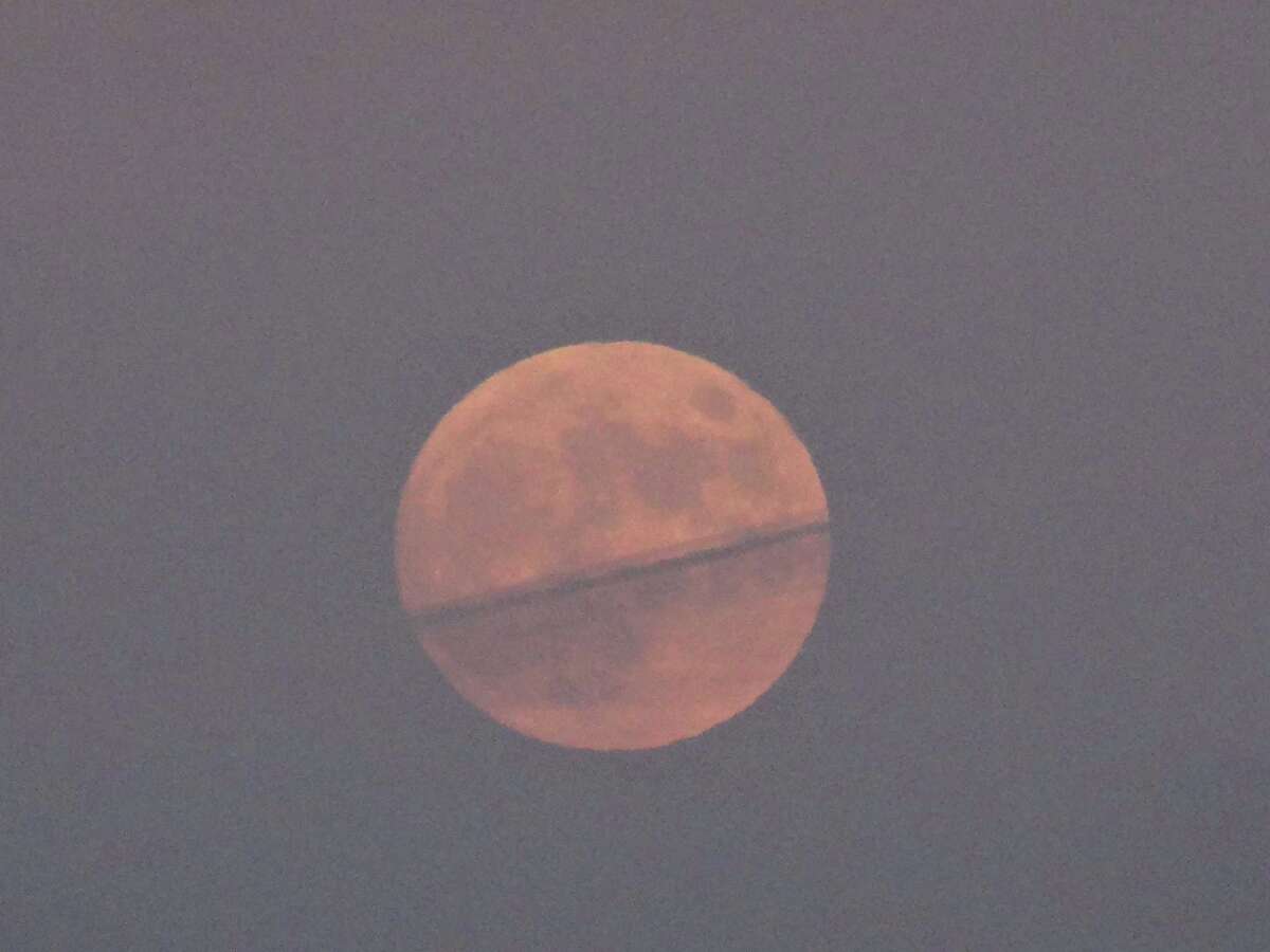 In photos: Beaver Moon rises over Long Island Sound