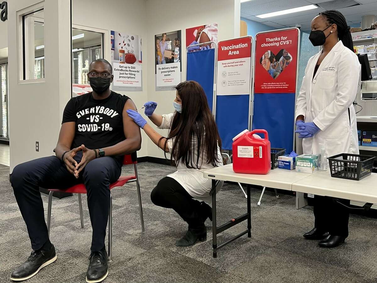 Michigan's Lieutenant Governor Garlin Gilchrist II received a booster shot of the Pfizer-BioNTech COVID-19 vaccine at the recommendation of his physician at a CVS Health Pharmacy in Detroit on Friday, Nov. 19, 2021.
