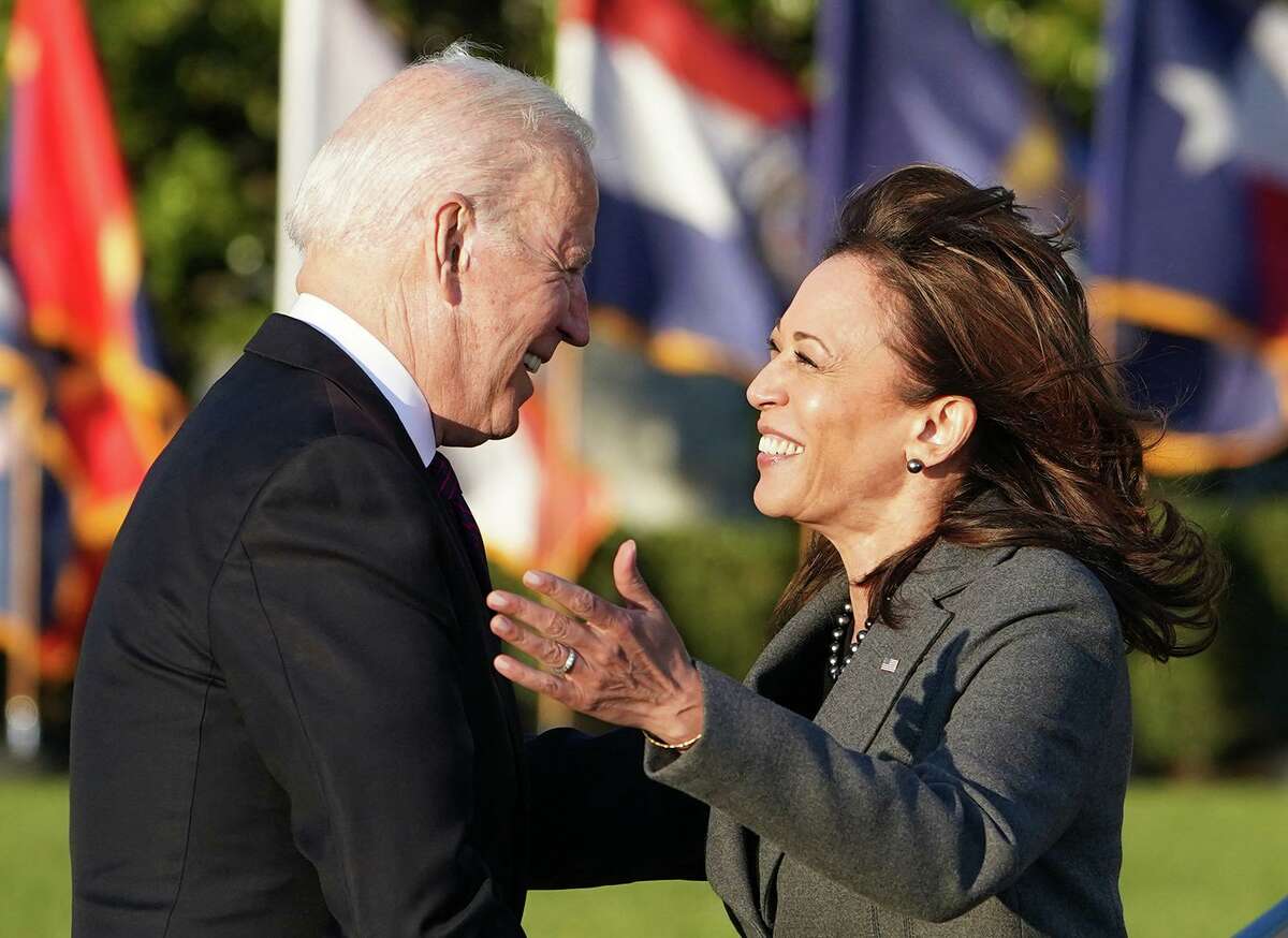 US Vice President Kamala Harris hugs US President Joe Biden during a signing ceremony for H.R. 3684, the Infrastructure Investment and Jobs Act on the South Lawn of the White House in Washington, DC on Nov. 15, 2021. (Mandel Ngan/AFP via Getty Images/TNS)