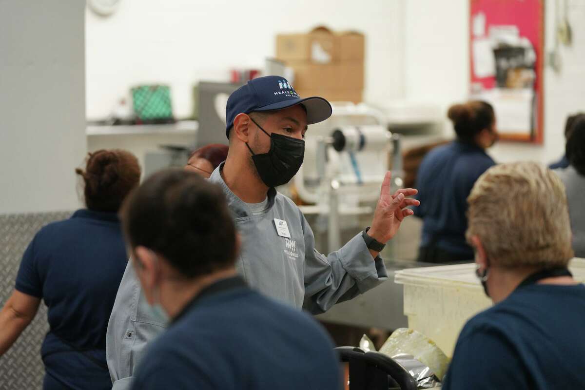 Oscar Lucio, food services manager for Meals on Wheels, who has worked for Meals on Wheels for two decades, starts his day at 4 a.m. to begin preparing thousands of meals for seniors in and around San Antonio.