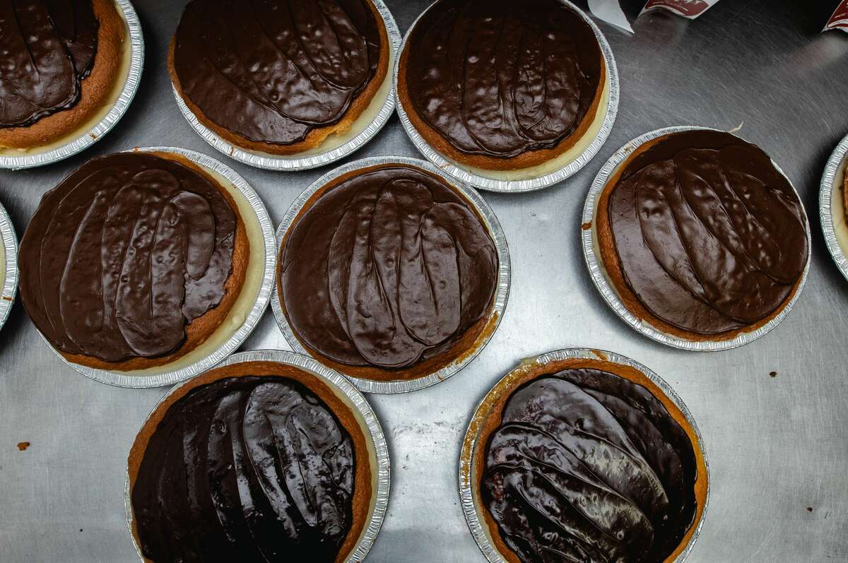 Boston cream pies ready to be packaged and labeled at Granny's Pie Factory in East Hartford on Nov. 14, 2021.