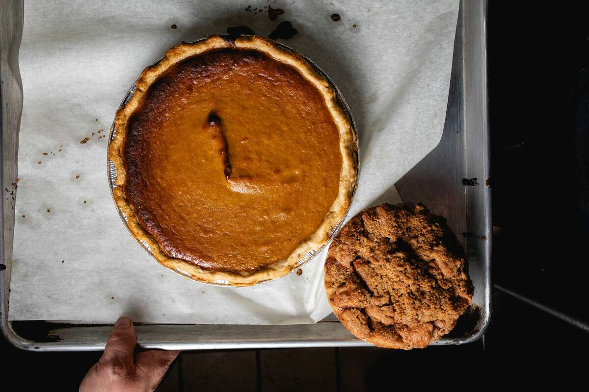A full-size pumpkin pie and a small apple crumb pie at Michele's Pies in Norwalk on Nov. 10, 2021.