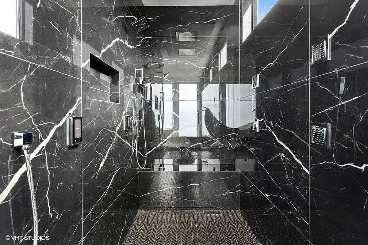 Marble walk-in shower.