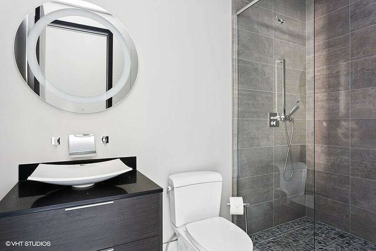 Bathroom with modern sink and shower.