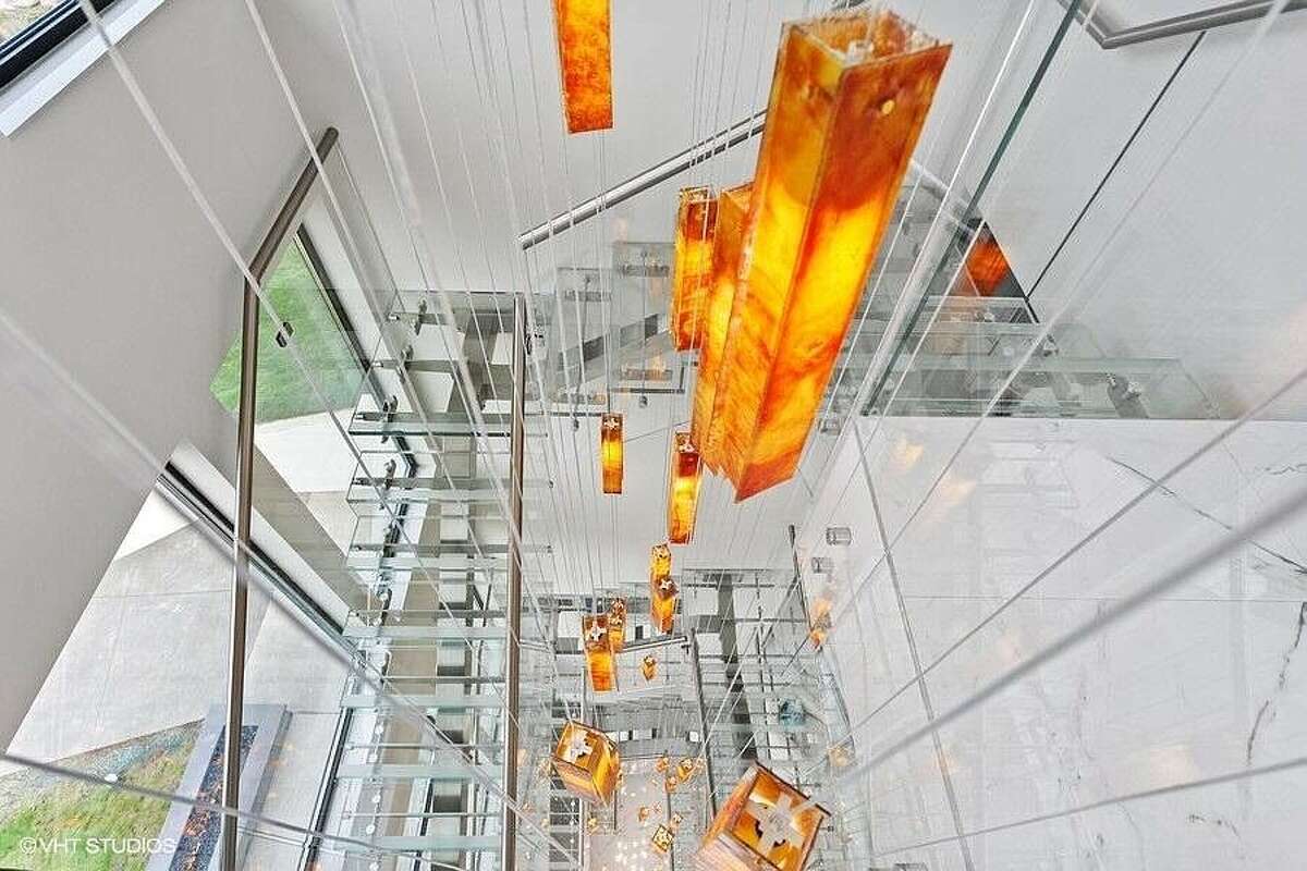 Glass staircase and lighting.