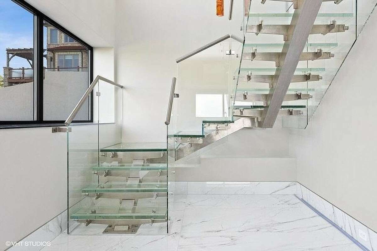 Bottom floor view of the glass staircase.