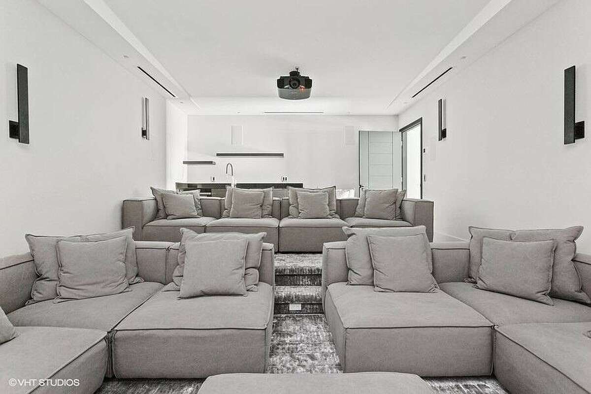 Ample seating in the home theater.