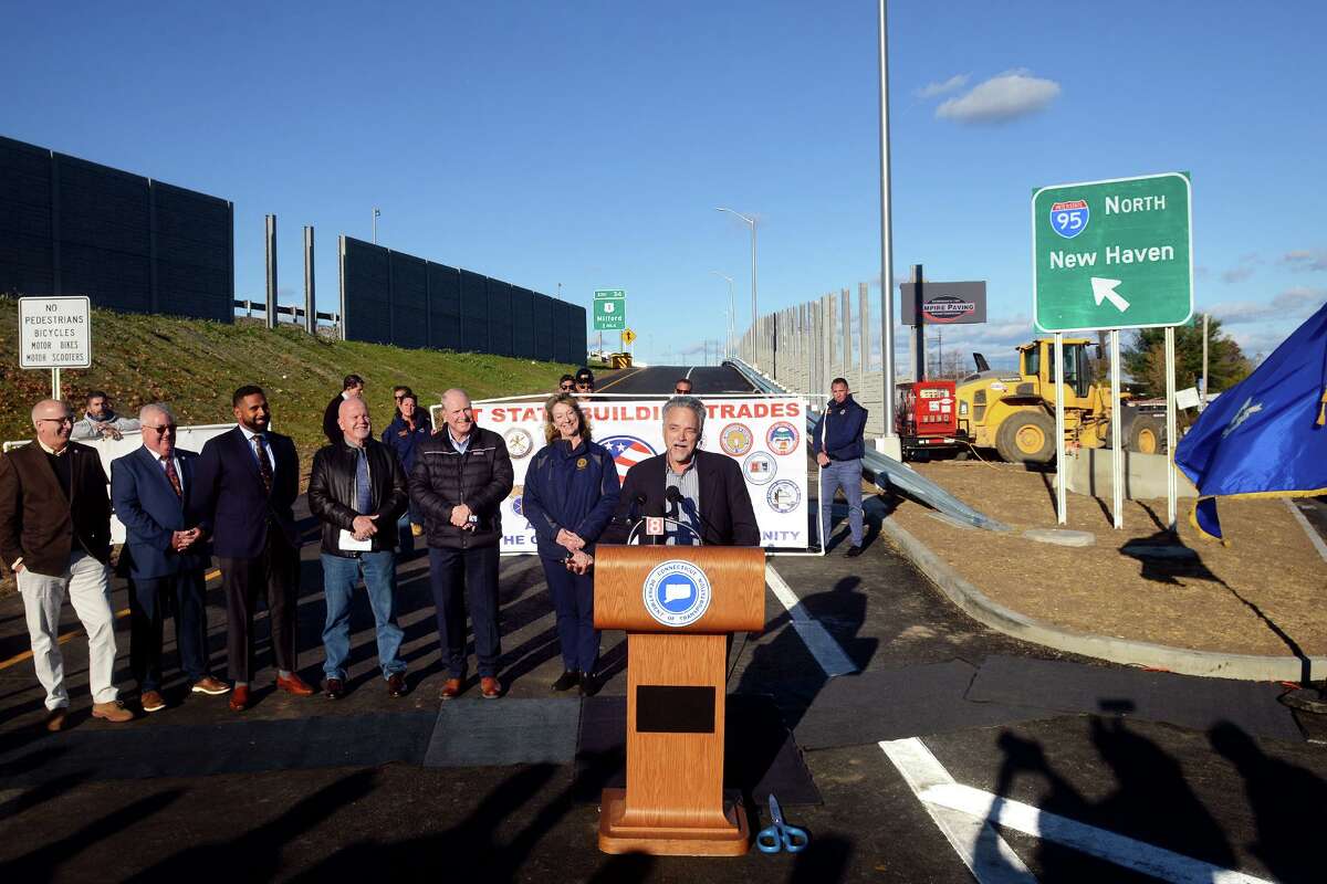 State DOT Commissioner Joe Giulietti speaks during a ribbon cutting ceremony at the new I-95 Exit 33 northbound on-ramp, in Stratford, Conn. Nov. 19, 2021.