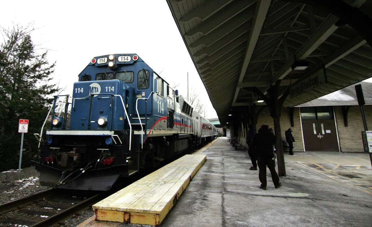 A Metro-North train pulls into the Derby/Shelton station in Derby, Conn., on Wednesday Jan. 31, 2018. Gov. Dannel P. Malloy postponed $4.3 billion in transportation projects including one which would have improved rail service by adding more trains and making track improvements on the Waterbury line.