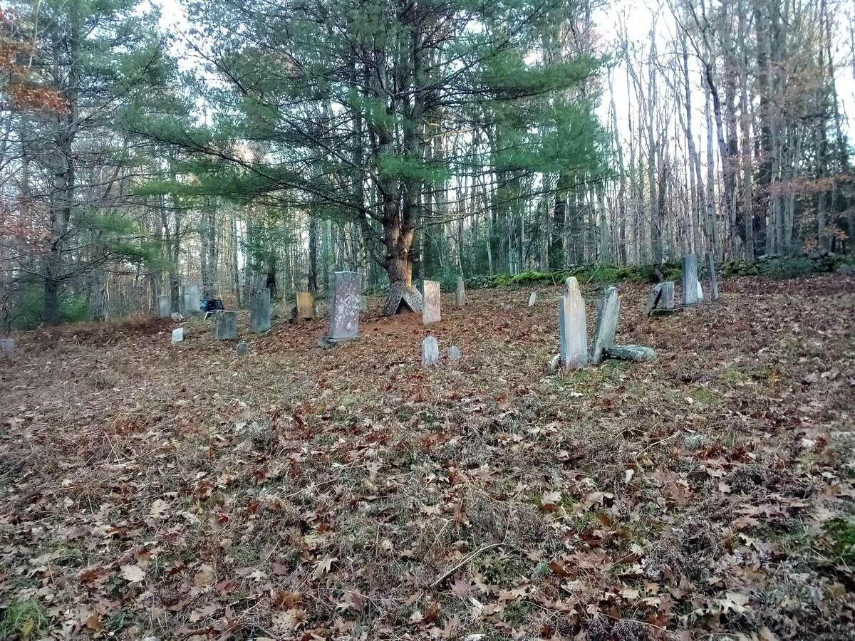 The Danbury Quarter Road cemetery, one of the town's oldest burial sites near Winchester Center, inaccessible, mostly because of the condition of the dirt road, filled with potholes, standing water and deep ruts, as well as steep inclines. Mayor Todd Arcelaschi wants to find a way to record who is buried there, clean up the one-acre property and possibly repair some of the many broken headstones.