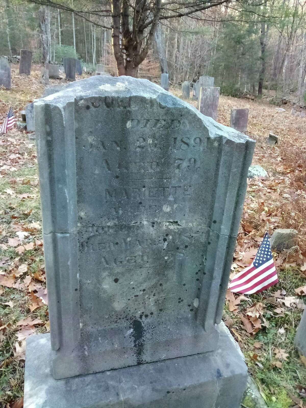 The Danbury Quarter Road cemetery, one of the town's oldest burial sites near Winchester Center, inaccessible, mostly because of the condition of the dirt road, filled with potholes, standing water and deep ruts, as well as steep inclines. Mayor Todd Arcelaschi wants to find a way to record who is buried there, clean up the one-acre property and possibly repair some of the many broken headstones.