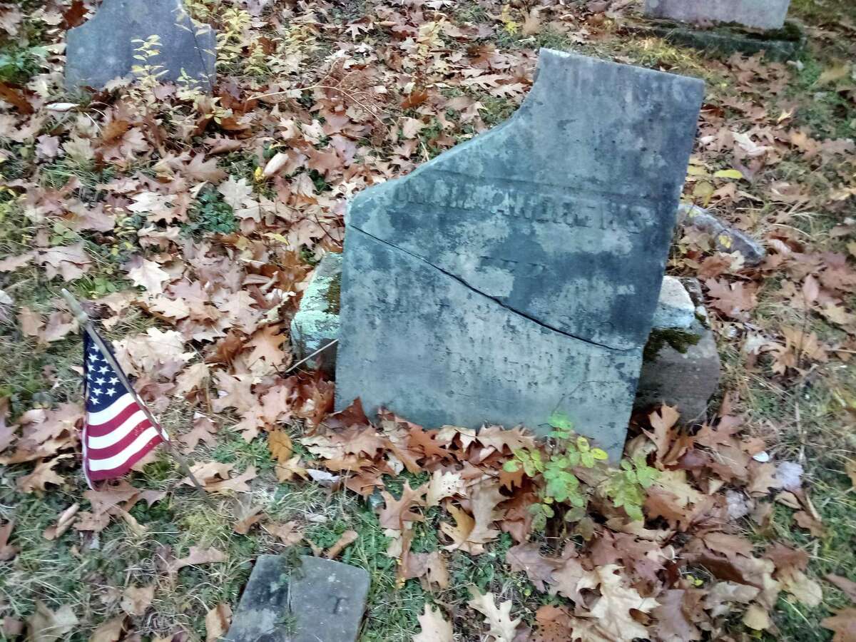 The Danbury Quarter Road cemetery, one of the town's oldest burial sites near Winchester Center, inaccessible, mostly because of the condition of the dirt road, filled with potholes, standing water and deep ruts, as well as steep inclines. Mayor Todd Arcelaschi wants to find a way to record who is buried there, clean up the one-acre property and possibly repair some of the many broken headstones.