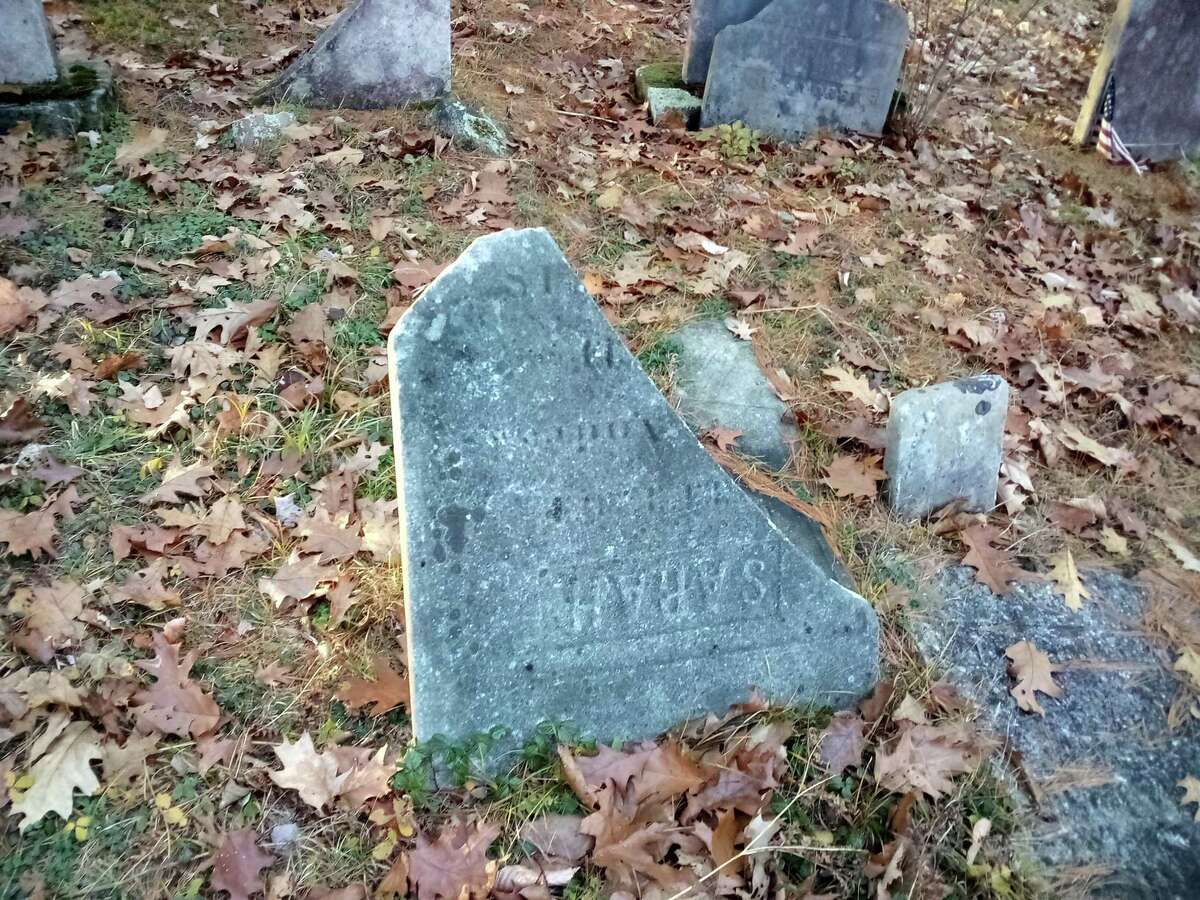 The Danbury Quarter Road cemetery, one of the town's oldest burial sites near Winchester Center, inaccessible, mostly because of the condition of the dirt road, filled with potholes, standing water and deep ruts, as well as steep inclines. Mayor Todd Arcelaschi wants to find a way to record who is buried there, clean up the one-acre property and possibly repair some of the many broken headstones.