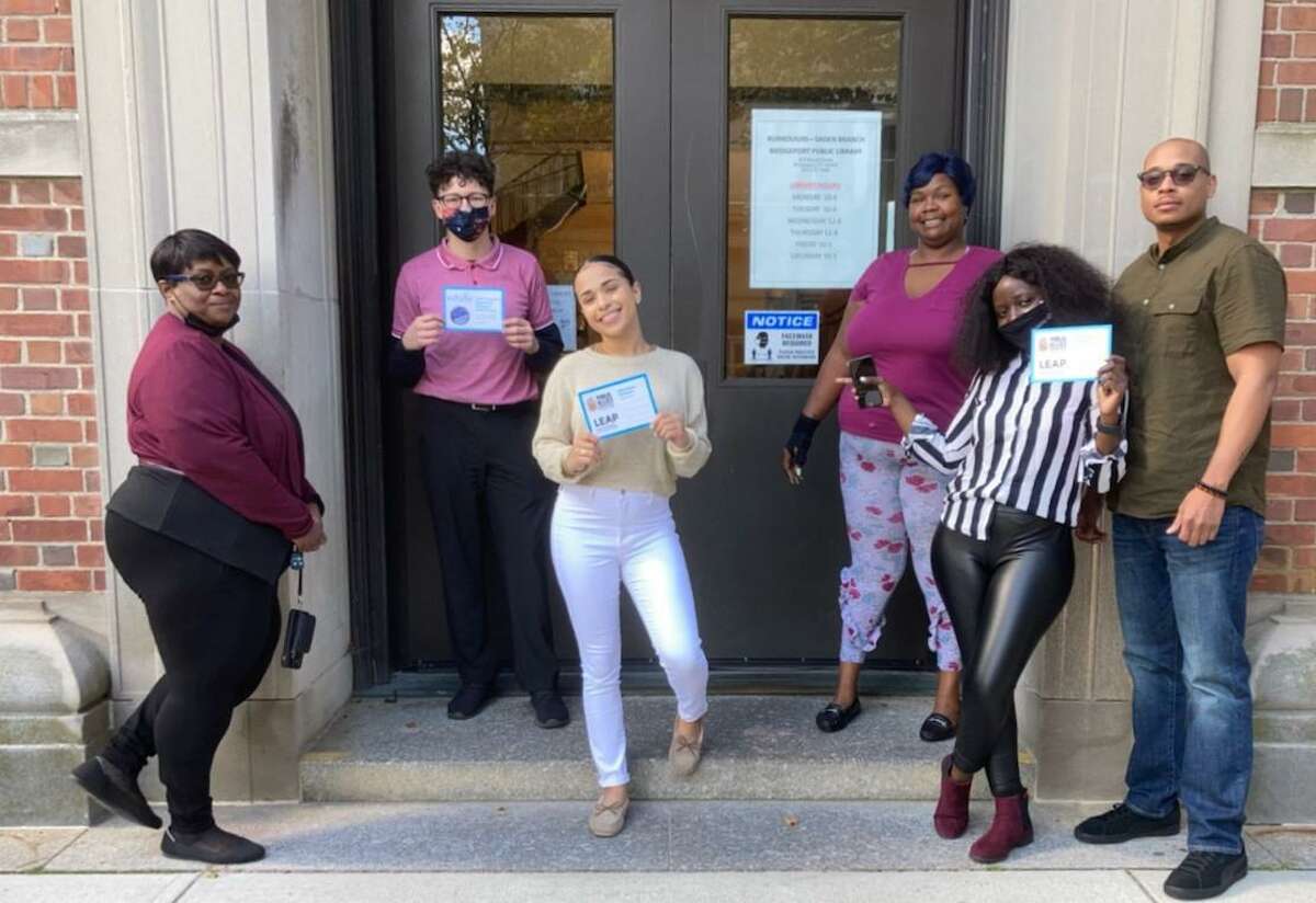 Representatives from RYASAP, a youth nonprofit based in Bridgeport, visit students at home to urge them back to school. The door-knocking initiative is part of a statewide program focused on learner engagement and attendance.