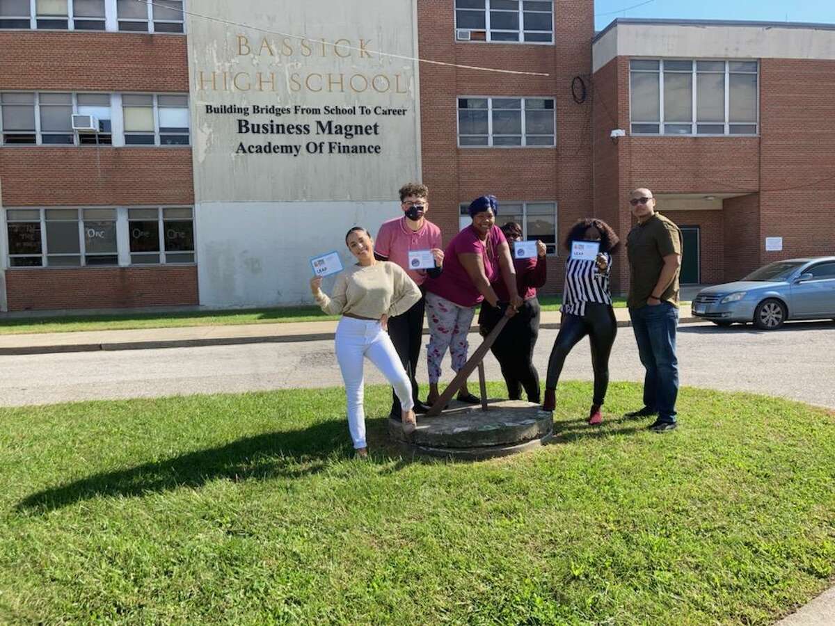 Representatives from RYASAP, a youth nonprofit based in Bridgeport, visit students at home to urge them back to school. The door-knocking initiative is part of a statewide program focused on learner engagement and attendance.