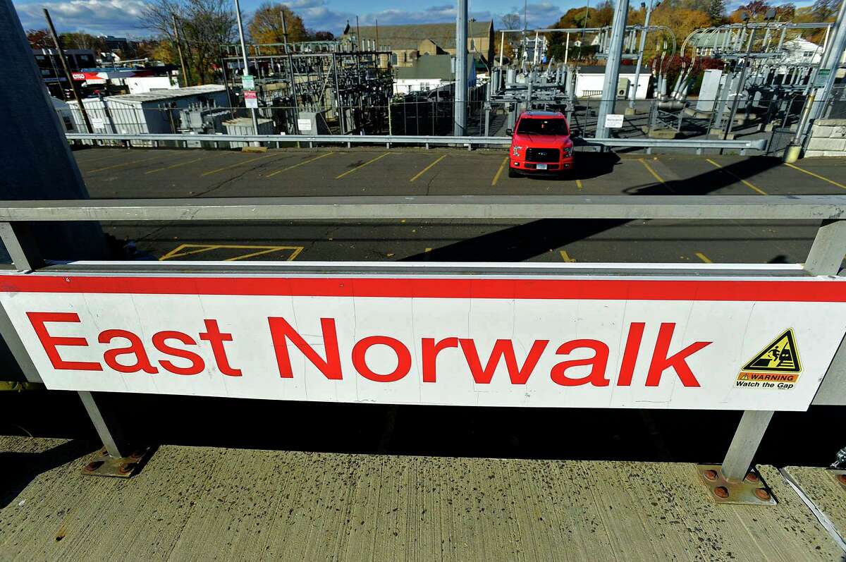 The East Norwalk train station parking lot Friday, November 19, 2021, in Norwalk, Conn. The city is having trouble selling all the monthly passes, a first