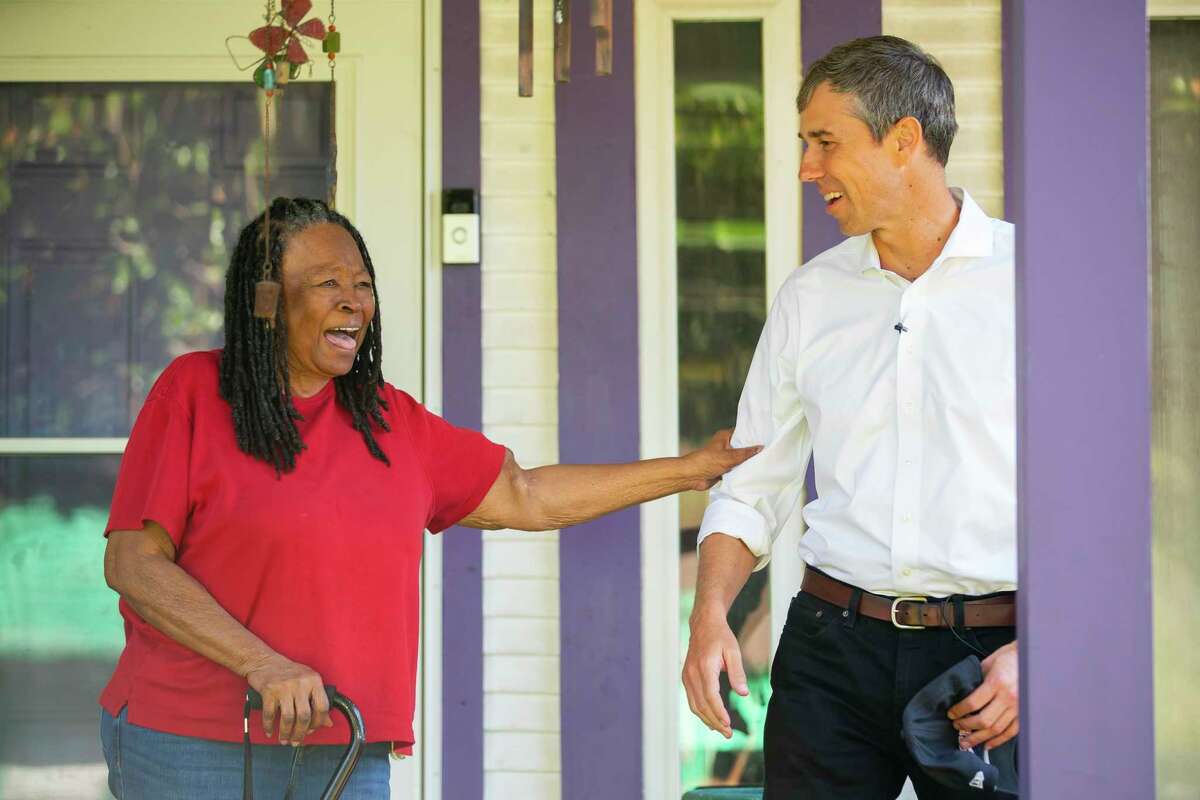 Sylvia Scarbrough says goodbye after meeting with gubernatorial candidate Beto O’Rourke at her Kashmere Gardens home, Friday, Nov. 19, 2021, in Houston. O’Rourke spent part of the afternoon visiting people in northeast Houston that lost power and had burst pipes during the freeze in February.