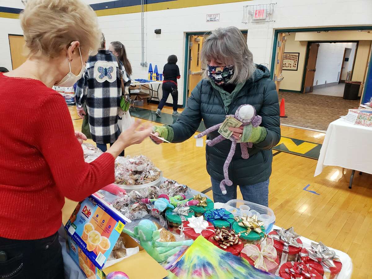 The Onekama Middle-High School gym was packed with artists, crafters, bakers and others for the Christmas in Onekama Craft Show on Saturday. 