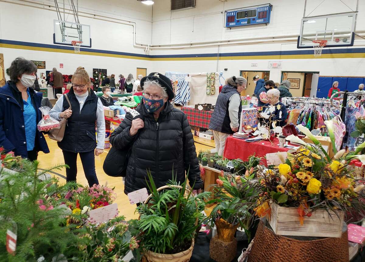 The Christmas in Onekama Craft Show featured about 45 vendors with booths in the Onekama Middle School gym on Saturday. Crafts ranged from pottery, rug hooking, plants, baked goods, cheeses and other items. 