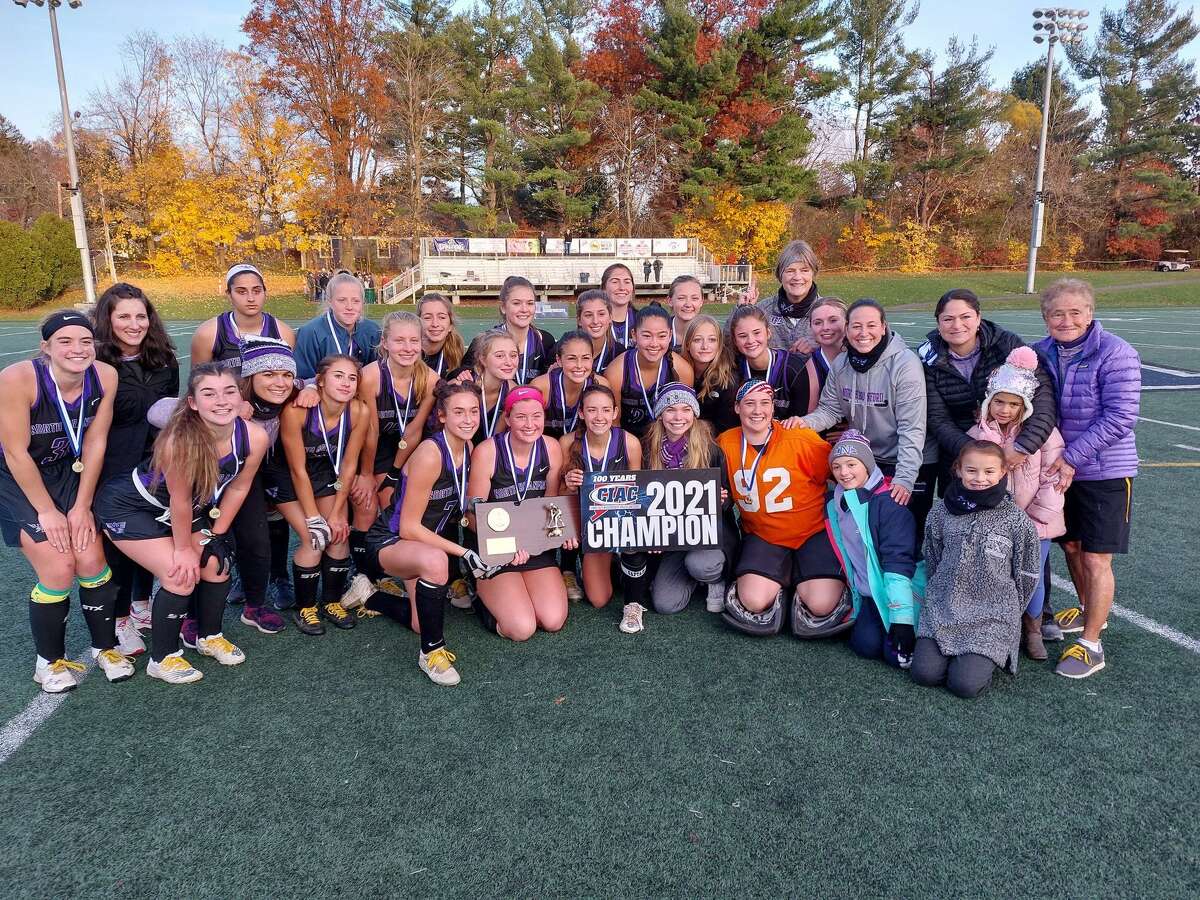 Members of the North Branford field hockey team celebrate their CIAC Class S championship win over Stonington Saturday.