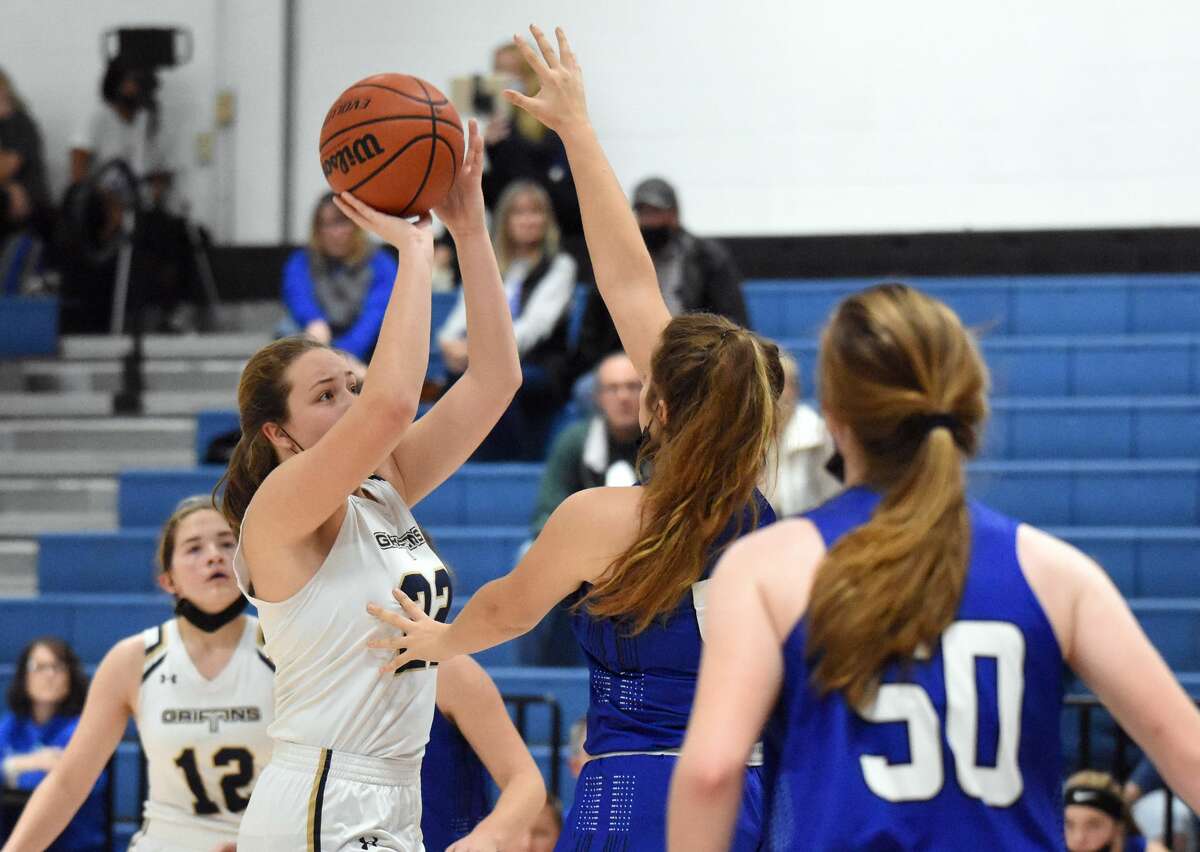 In this file photo, Father McGivney's Charlize Luehmann attempts a jumper against Greenville in the fifth-place game of the Columbia Invitational.