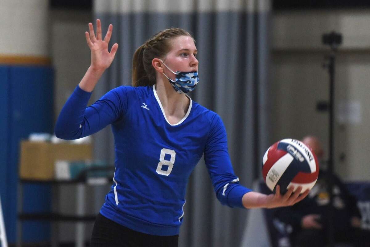 Ludlowe’s Jane Ransome gets ready to serve against Greenwich duing the CIAC Class LL girls volleyball championship on Saturday in East Haven.