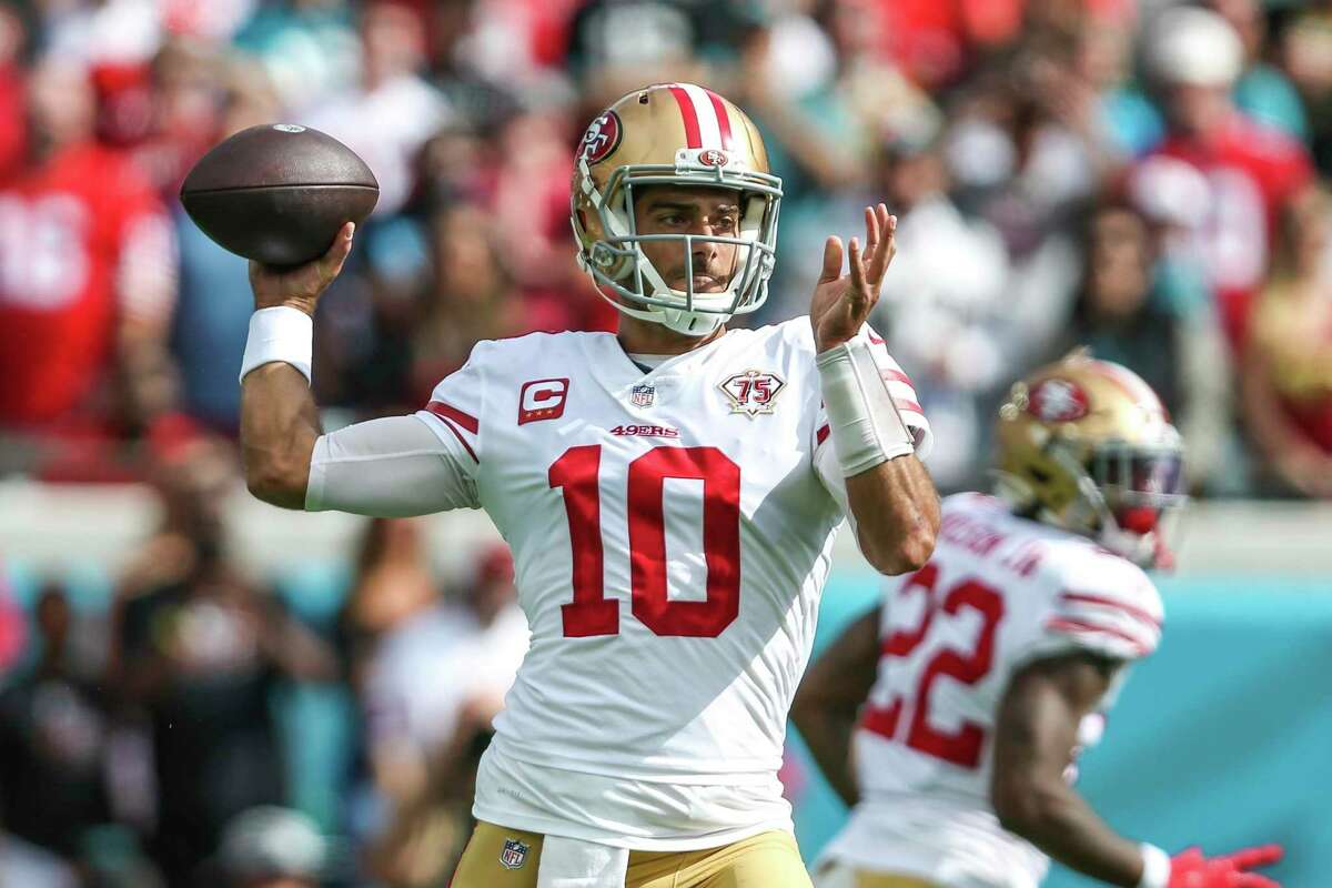 San Francisco 49ers quarterback Jimmy Garoppolo (10) throws a pass during the first half of an NFL football game against the Jacksonville Jaguars, Sunday, Nov. 21, 2021, in Jacksonville, Fla. (AP Photo/Gary McCullough)