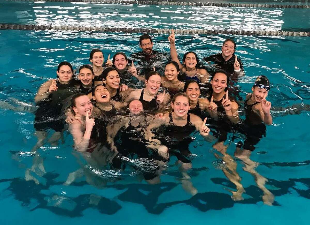 Members of the Greenwich girls swimming and diving team celebrate after winning the CIAC State Open at Cornerstone Aquatics Center in West Hartford. The State Open title is the 22nd for the Cardinals.