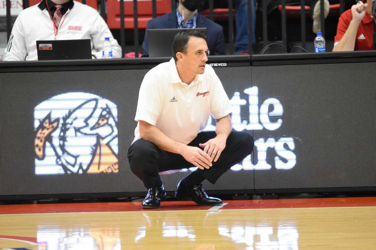 SIUE men's basketball coach Brian Barone takes in the action against Knox College from the sideline inside First Community Arena.
