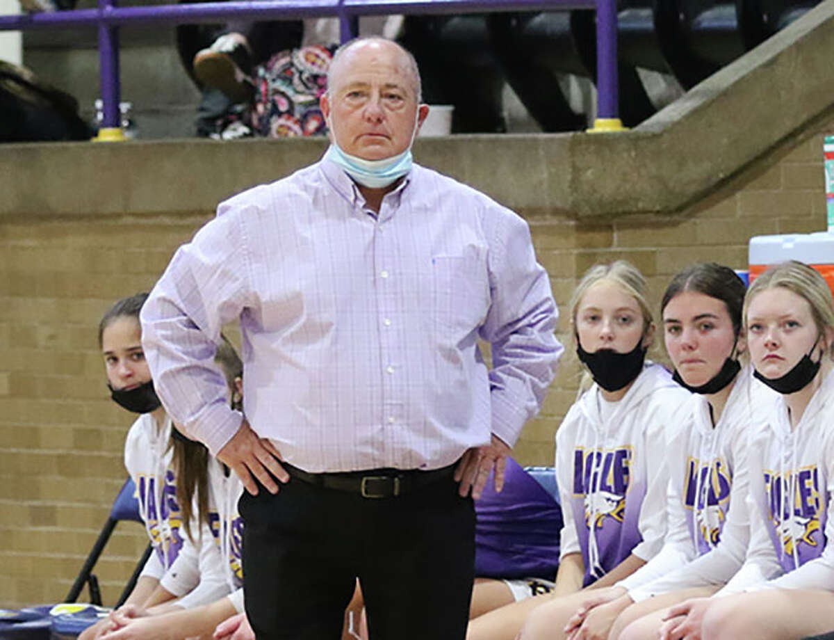 CM coach Mike Arbuthnot watches his Eagles from in front of the team's bench Saturday at the Taylorville Tourney.