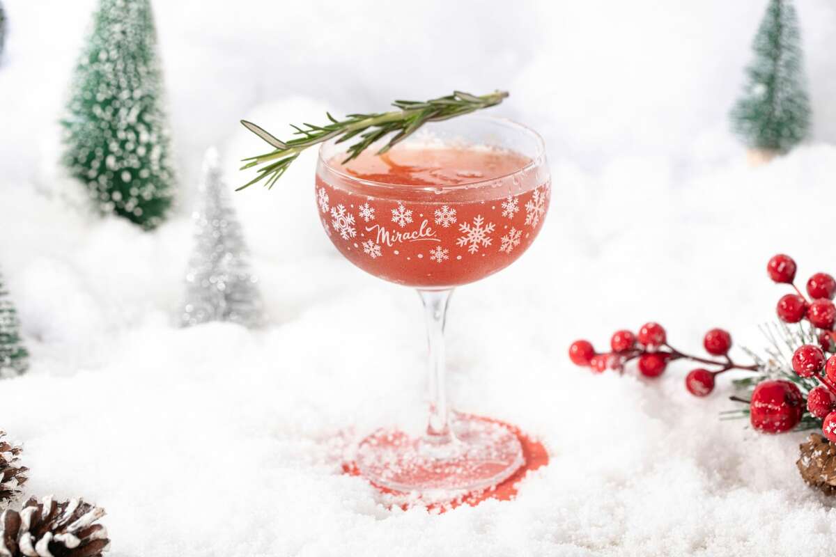 Christmaspolitan (vodka, elderflower liqueur, lime, rosemary, spiced cranberry sauce) at Miracle.