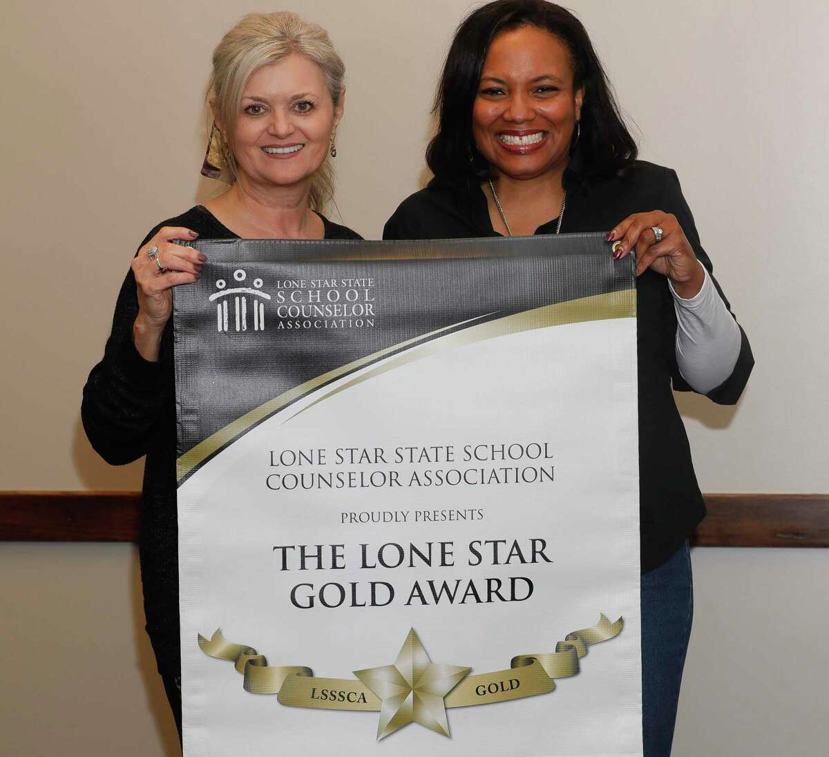 Caney Creek High School counselors Tiffany Rhodriguez, left, and Jan Stronger-Lindberg are part of the 10-person counseling staff that won the Lone Star State School Counselor Association’s gold award, which recognizes effective and outstanding school counseling programs.