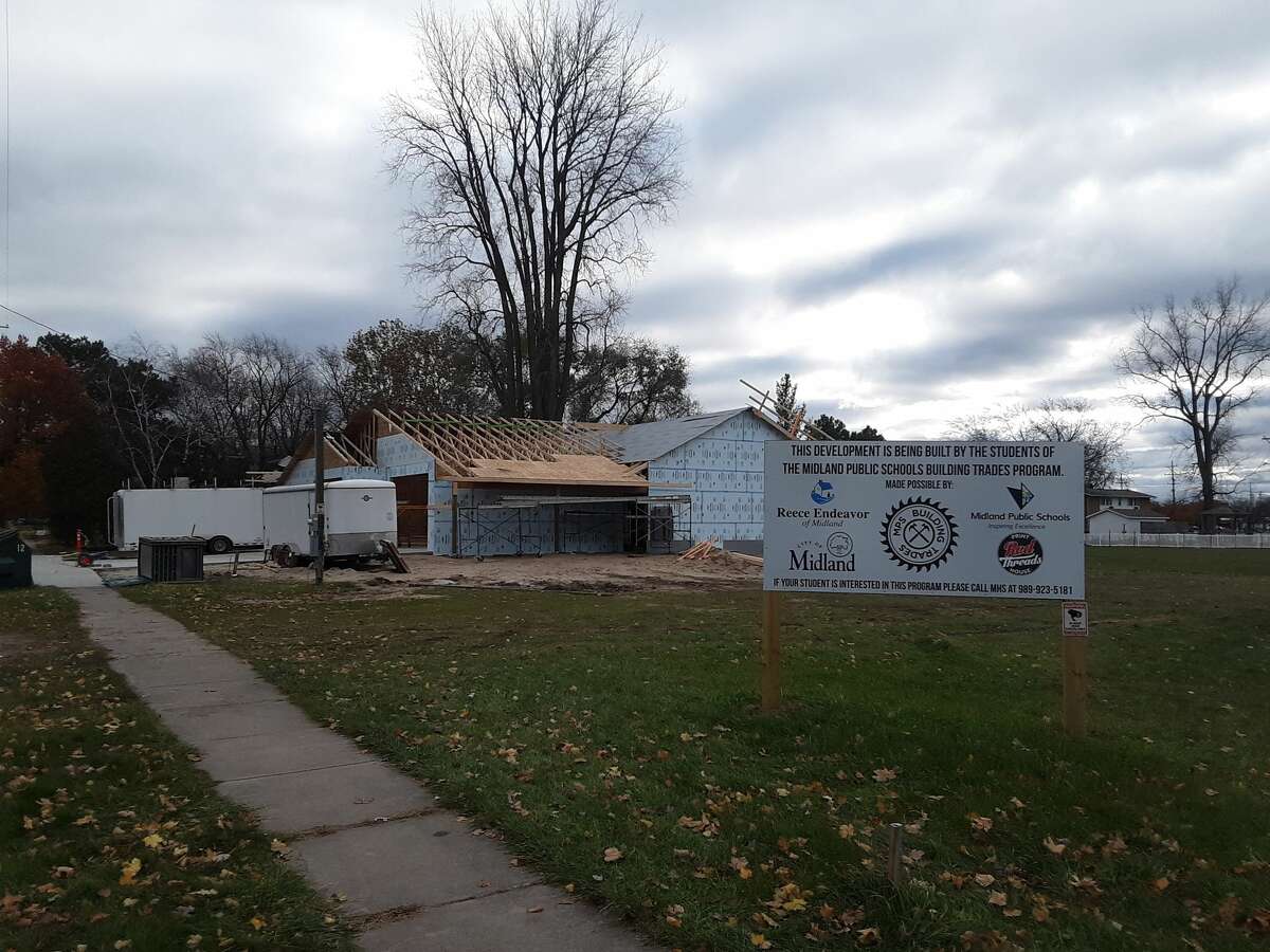 This duplex at the corner of Ashman and Cambridge, currently being built by Midland Public Schools building trades students, marks the 40th house of the Reece Endeavor, whose stated mission is "to meet the growing housing needs of people with special needs throughout Midland County." It's also the fifth house constructed in partnership between MPS, the Reece Endeavor, the City of Midland, and local contractors.