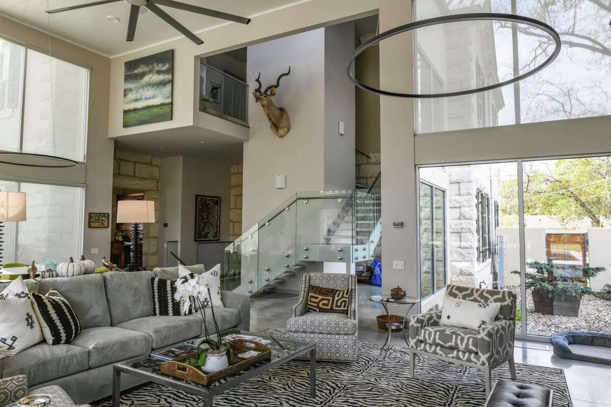 A contemporary great room contrasts with the historic features of the classic Hill Country home.