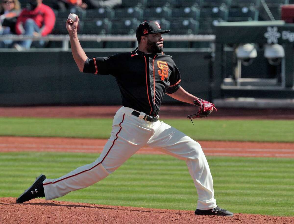 Jay Jackson (65) pitches as the San Francisco Giants played the Los Angeles Angels at Scottsdale Stadium in Scottsdale, Ariz., on Sunday, February 28, 2021.