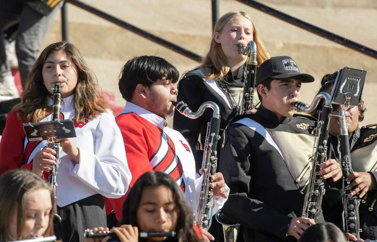 Members of the Sweetwater and Big Spring band volunteered to perform together in place of the Andrews band 11/22/2021 at the Class 4A Division 1 area playoff at the Mustang Bowl in Sweetwater, Texas. Tim Fischer/Reporter-Telegram
