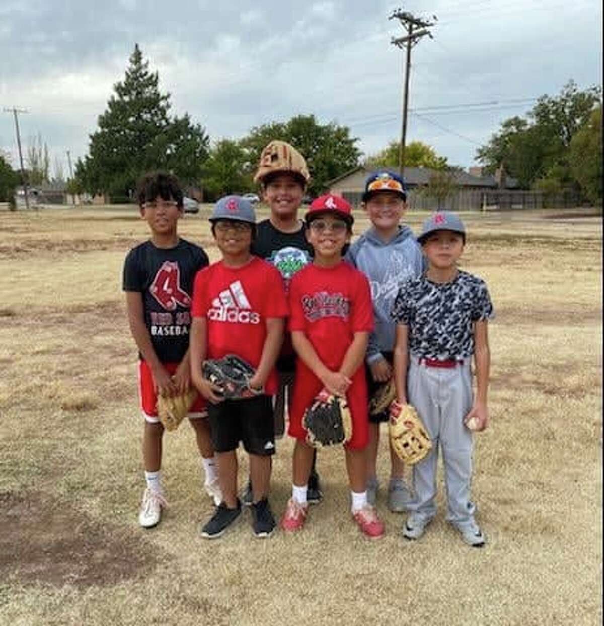 Young Plainview baseball players extinguish fire at local park