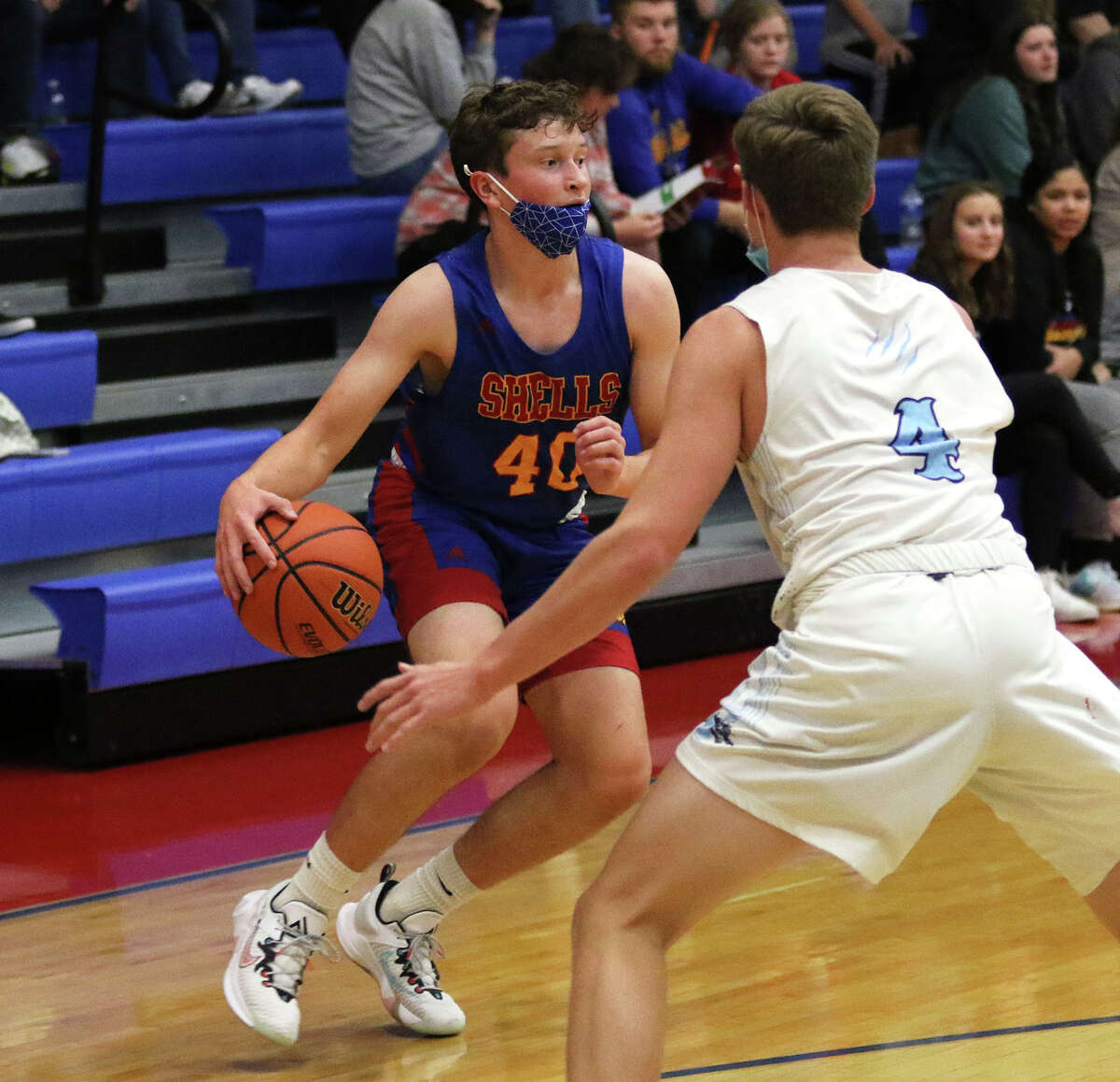 Roxana's Aidan Briggs (left) scored 20 points, including five 3-point baskets, Tuesday against Greenville at the Duster Thomas Hoops classic in Pinckneyville