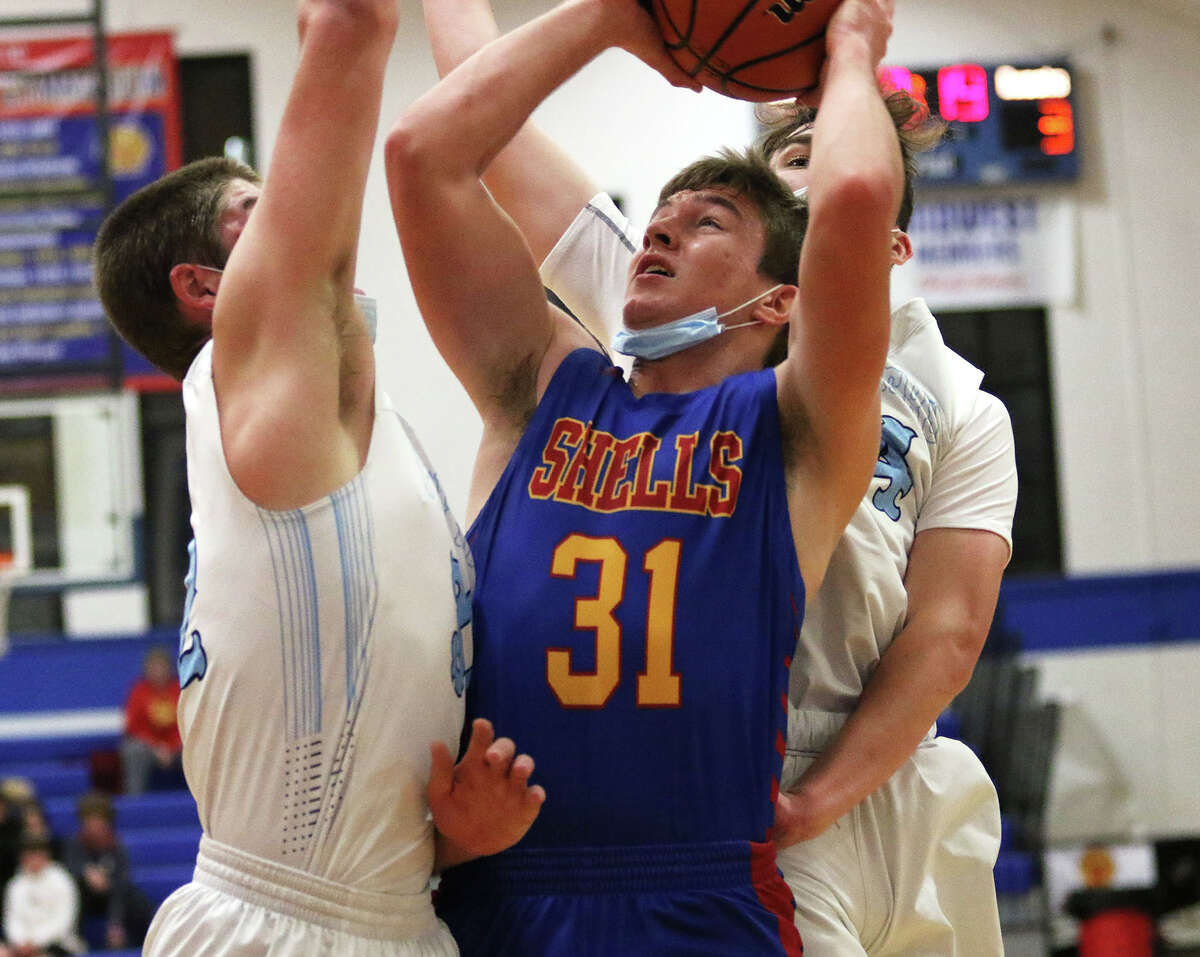 Roxana's Evan Wells (31) scored 13 points and pulled down 10 rebounds in a 42-40 victory over Okawville Wednesday at the Duster Thomas Hoops Classic in Pinckneyville.