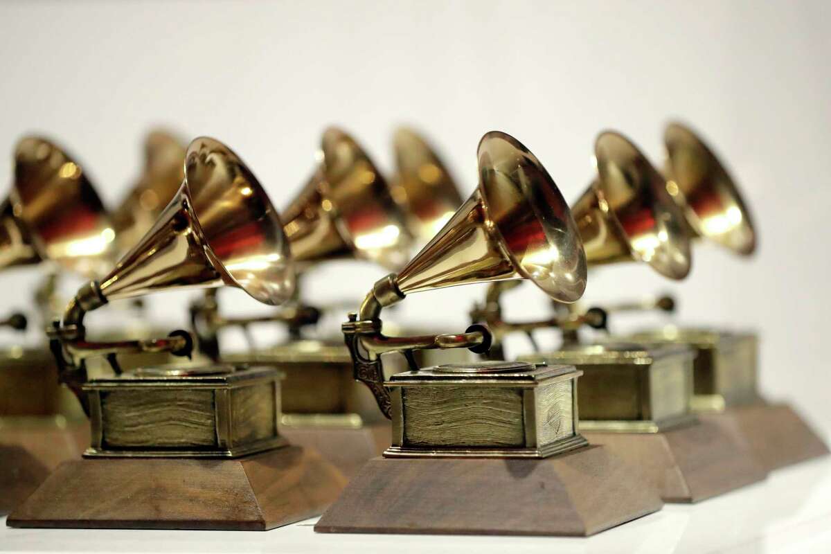FILE - Grammy Awards are displayed at the Grammy Museum Experience at Prudential Center in Newark, N.J. on Oct. 10, 2017. The Recording Academy will announce the nominees for its 64th Grammy Awards on Tuesday morning.