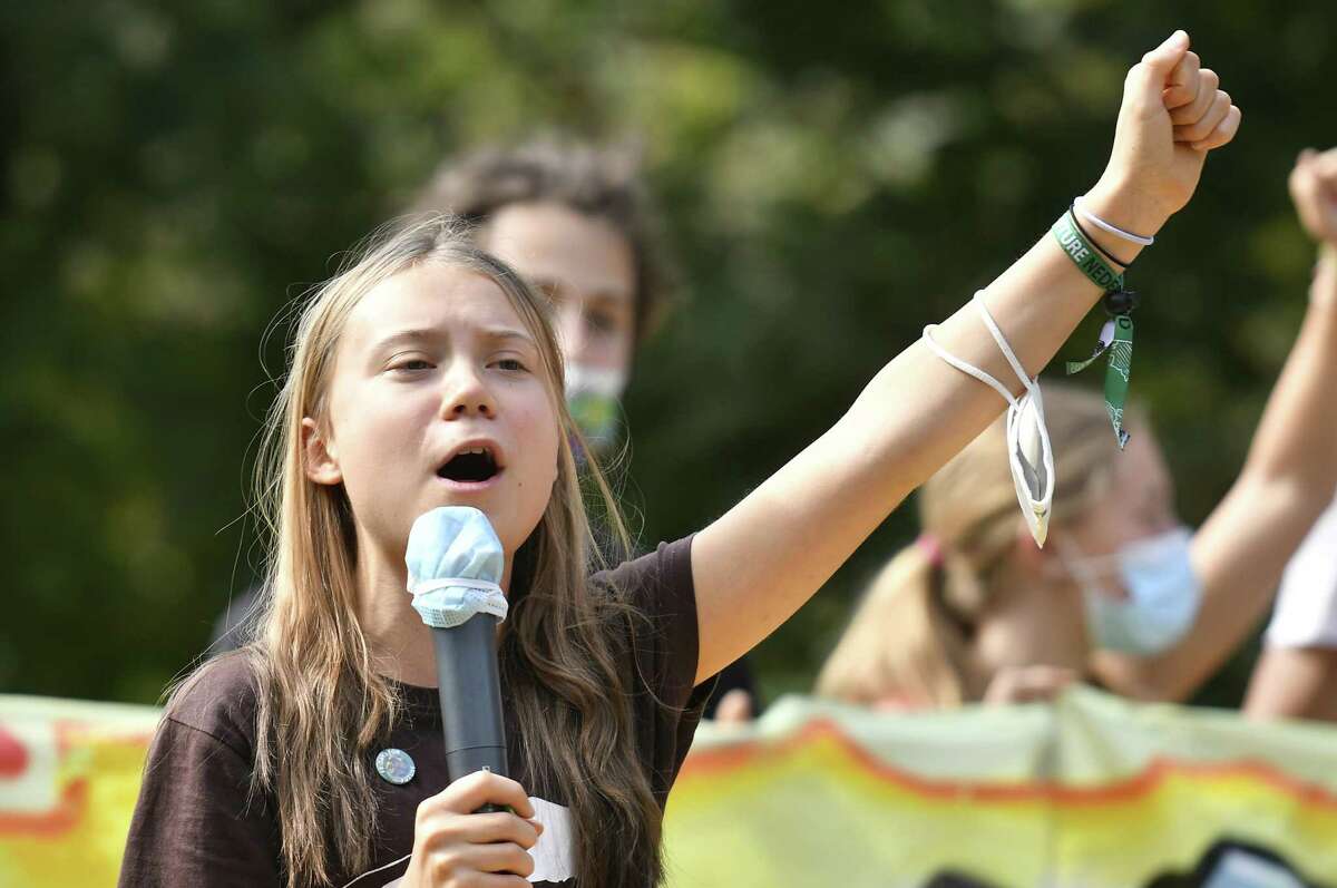 Greta Thunberg speaks during the climate strike march on Oct. 1, in Milan, Italy. On the sidelines of various pre-COP26 summits on the topic of climate change and climate finance, students, young activists and civil society march for action against climate change.
