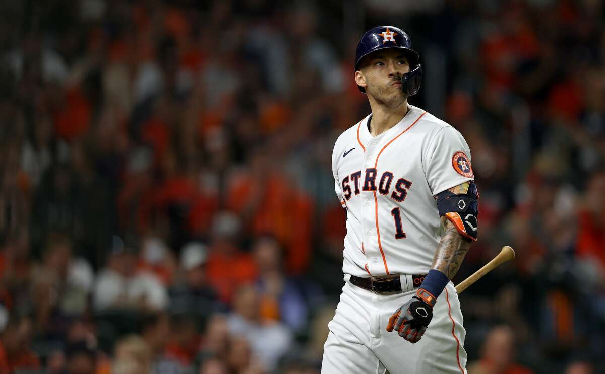 The Astros' Carlos Correa reacts after striking out against the Atlanta Braves during the first inning in Game Six of the World Series at Minute Maid Park on November 02, 2021.
