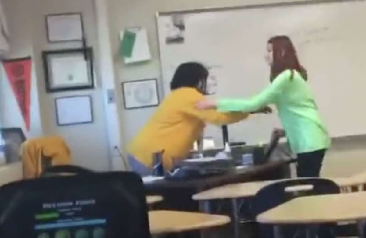 A student is seen hitting a teacher at Castleberry High School near Fort Worth. Police are investigating after the student called home and said, "This teacher's about to get f----- up if she doesn't get the f--- away from me. You want to talk to her? She's Black, and she's pissing me off right now."