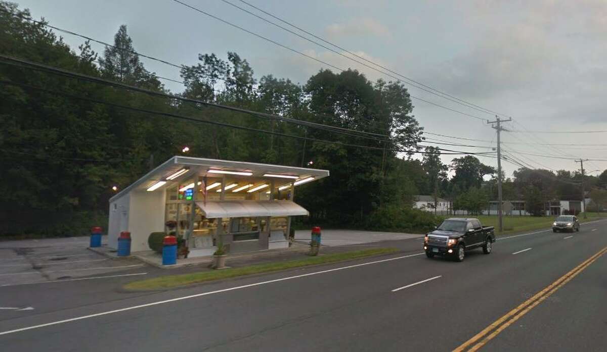 A town meeting on Dec. 8 will decide if a vacant piece of land along Route 7 will be accepted as open space. The 7.41 acre parcel is located east of the thoroughfare, and a bulk of it is behind Ridgefield Ice Cream.