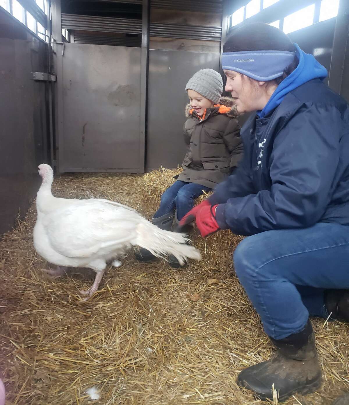 Elaine Bossingham, owner of Country View Farms in Manistee, brought a pair of turkeys to visit the preschoolers of Trinity Lutheran School on Thursday.
